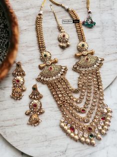 Bridal Designer Multicolor 22k gold plated Maharani Gold Tayani Premium Necklace Haram set with Maangtikka. Yellow Gold Kundan Jewelry For Puja, Yellow Gold Kundan Necklace For Diwali, 22k Gold Meenakari Chandbali Jewelry Sets, 22k Gold Kundan Necklace With Intricate Design For Puja, 22k Gold Bollywood Jewelry With Latkans, Ceremonial Gold Kundan Necklace Hand Set, Heavy Temple Jewelry Set In 22k Gold, Gold Temple Jewelry With Hand Set Details, Bollywood 22k Gold Jewelry Sets For Diwali