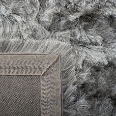 Luxuriant style is on full display in the Ocean Shag Rug Collection. These plush, thick pile shag rugs (2.50") are hand-tufted using wispy synthetic yarns creating a marvelous sense of motion and decorative dimension. Ideal for large living areas, contemporary clean-lined furnishings or to add touch of glam.Pile Height: 0.63 Solid Area Rugs, Muddy Paws, Shag Rugs, Lodge Style, Silver Rug, Silver Area Rug, Black Area Rugs, Rugs Size, In The Ocean