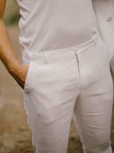 "ETHICALLY MADE. Every linen pants is handmade using the body measurements of the individual customer. No factory use. Every creative and sewing task is fairly rewarded. DESCRIPTION: - Two buttons closure - Two side pockets - Two back pockets - Loops for a belt - Zipper - Handcrafted Color in the picture- snow white. Other colors are available. Material: 100 % softened Lithuanian linen, medium weight, 205 g/m2. Fabric of this linen pants IS WASHED BEFORE SEWING. Therefore you do not need to worr White Slim Fit Straight Pants, White Slim Fit Pants For Summer, Summer Slim Fit White Pants, Summer White Slim Fit Pants, White Slim Fit Straight Leg Dress Pants, Fitted White Dress Pants, White Fitted Dress Pants For Summer, Fitted White Tapered Leg Pants, White Fitted Tapered Leg Pants