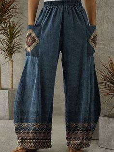 Casual Wide-leg Patchwork Bottoms, Summer Patterned Bottoms With Pockets, Patterned Summer Bottoms With Pockets, Casual Patterned Bottoms With Pockets, Non-stretch Casual Printed Pants, Casual Patterned Wide Leg Harem Pants, Casual Printed Cotton Wide Leg Pants, Bohemian Blue Wide Leg Pants With Pockets, Patterned Long Pants With Pockets