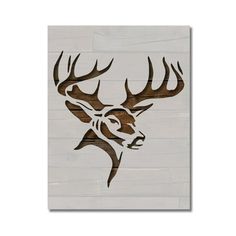 a wooden sign with a deer's head and antlers on the side of it