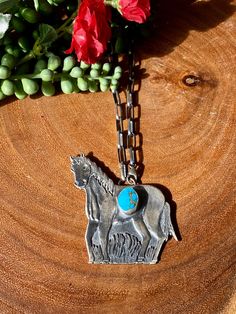 Joe Paul Kingman Turquoise Sterling Silver Horse Adjustable Necklace. It measures 31 inches long with hang while the chain by itself measures 25 inches but can adjust to fit as a chocker or a lariat style. Signed by the artist and stamped sterling silver. Thank you for checking out my store, if you have any questions please contact me!! SKU:39754317299797_d3f2175* Western Style Lariat Necklace For Gifts, Handmade Western Style Necklace For Gift, Western Style Turquoise Necklace With Large Pendant, Western-style Turquoise Necklace With Large Pendant As Gift, Western Turquoise Necklace With Large Pendant For Gifts, Western Style Silver Turquoise Necklace As Gift, Western Style Turquoise Necklace With Large Pendant As Gift, Turquoise Pendant Charm Necklace With Adjustable Chain, Western Style Blue Necklace For Gift