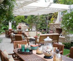 an outdoor dining area with tables and chairs