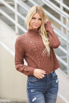 The stretchy textured knit of our Grace Mockneck Sweater makes this stylish sweater also one of the comfiest in your closet. Dress it up with a skirt and booties or jeans and boots because there's no reason to sacrifice your signature style just because it's a little chilly out. Model is 5’7” wearing a size small Length of a small is 19" 54% Cotton, 27% Acrylic, 19% Polyester Mockneck Sweater, Stylish Sweater, Crochet Clothing, Stylish Sweaters, Sweater Making, Mock Neck Sweater, Textured Knit, Just Because, Signature Style