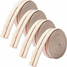 four pieces of white rope with red stitching