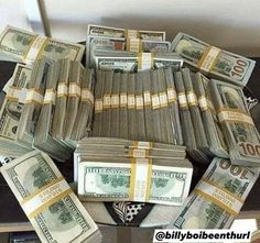 stacks of money sitting on top of each other