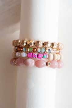 Introducing Kodie Bracelet Stacks, the ultimate accessory for this Spring/Summer season! Elevate your style with these vibrant and trendy bracelets that are perfect for layering. Each stack features a combination of colorful beaded bracelets, carefully curated to create a playful and eye-catching look. Whether you're headed to a music festival, beach party, or simply want to add a touch of fun to your everyday outfits, these bracelets are a must-have. With their versatile design and high-quality Stackable Casual Beaded Bracelets For Summer, Trendy Stackable Summer Bracelets, Colorful Stackable Adjustable Bracelets, Playful Colorful Summer Bracelets, Playful Multicolor Stackable Bracelets, Colorful Beaded Bracelets, Layering Bracelets, Bracelet Stacks, Trendy Bracelets