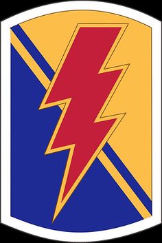 an emblem with a lightning bolt in the center and blue, yellow and red colors