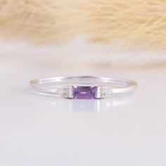 925 sterling silver small & delicate womens promise ring, Tiny petite silver amethyst promise ring for her,Baguette cut purple amethyst ring WE OFFER UNLIMITED PERIOD INSTALLMENTS PLAN This is a beautiful, stunning, feminine ring that works well for all occasions, styles, and ages. You will love it! Ring information: Main stone: Amethyst Approximate size: 4x2mm Accent stones: Cubic zirconia Approximate size: 1.5mm (2 stones) Metal type: Silver Metal stamp: 925 sterling silver Installment Pay Minimalist Cubic Zirconia Birthstone Ring With Gemstone, Elegant Amethyst Birthstone Ring In Cubic Zirconia, Minimalist Cubic Zirconia Gemstone Rings, Silver Minimalist Emerald-cut Jewelry, Minimalist Emerald Cut Silver Jewelry, Minimalist Silver Emerald-cut Jewelry, Elegant Amethyst Cubic Zirconia Birthstone Ring, Adjustable Birthstone Ring In Cubic Zirconia, Adjustable Cubic Zirconia Birthstone Ring Fine Jewelry