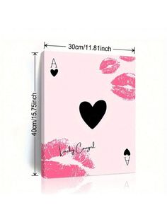 a pink card with black heart and lips on it, next to a white background