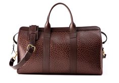 Luxury Duffle Bag With Leather Lining For Overnight Trips, Elegant Brown Duffle Bag For Overnight Trips, Luxury Brown Duffle Bag For Business Trips, Elegant Leather Duffle Bag For Trips, Luxury Brown Travel Bag For Business Trips, Luxury Travel Luggage With Leather Backing, Luxury Leather Trim Duffle Bag For Overnight Trips, Luxury Luggage For Overnight Trips With Zipper Closure, Designer Leather Duffle Bag For Travel