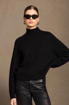 The beauty of the Taya turtleneck lies in its attention to detail. Crafted from irresistibly soft cashmere and adorned with ribbed trim, it effortlessly combines elegance and comfort to all of your winter looks. Learn more about our Made in Italy collection here. 380 grams of 100% pure cashmere in 7-gauge knit Turtleneck pullover Ribbed trim Made in Italy 22" length (size small) Machine Wash Cold, Lay Dry in Shade, or Gentle Dry Clean All sale items are FINAL SALE. Blackberry Color, Onyx Colour, Turtleneck Pullover, Genetically Modified, Knit Turtleneck, Winter Looks, Cashmere Sweater, Cashmere Sweaters, Blackberry