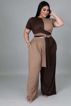 Two-piece set Crop top Round neckline Short sleeves Self-tie No closure High waisted pants Wide legs Pockets No closure 96% polyester 4% spandex Hand wash cold Model is wearing a 2X MODEL STATS Height: 5.6" Bust:34" / Waist:25" / Hips:41" Brown Wide Leg Pants Outfit, Plus Size Crop Top Outfit, Jesenia Perez, Plus Size Crop Top, Gala Outfits, Summer Two Piece Outfits, Tan Outfit, Chocolate Brown Dress, Plus Size Crop Tops