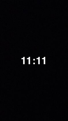 a black background with white text that reads 11 11