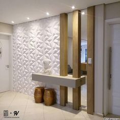 a bathroom with white tile and wooden accents on the walls, along with two stools