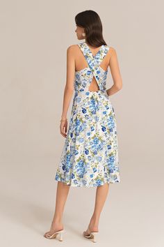 Made from soft & comfortable fabric, this moderately stretchy dress is fully lined for added comfort. The elastic back waistline creates a flattering fit, while the flared A-line silhouette adds a touch of femininity.Material : Shell:98%Polyester+2%Viscose; Lining:95%Polyester+5%ElastaneElasticity : None.Sku : CL2615S24Package : 1*DressCare instructions: Wash dark colors separately. Remove decorations before washing. No soaking. Knee-length Tie Back Midi Dress For Garden Party, Knee-length Midi Dress With Tie Back For Garden Party, Chic Blue Dress With Tie Back, Spring Sleeveless Midi Dress With Fitted Waist, Spring Dresses With Elastic Back And Stretch, Spring Stretch Midi Dress With Ruched Back, Midi Dress With Smocked Back And Fitted Waist, Elegant Summer Dress With Elastic Back, Stretch Midi Dress With Tie Back