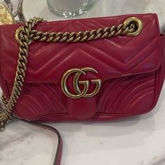 Gg Marmont Small Matelass Shoulder Bag Red With Gold Logo And Chain. Used But In Good Condition Gucci Marmont Matelasse, Gg Marmont Small Matelassé Shoulder Bag, Gucci Red Marmont Bag, Gucci Dionysus Mini, Dark Brown Leather Bag, Gucci Gg Marmont Matelasse, Cheap Red Shoulder Bag With Gold-tone Hardware, Gucci Vintage Bag, Gucci Rectangular Shoulder Bag With Gold-tone Logo