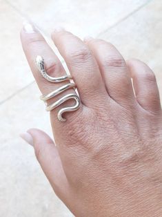 Model : Classic Snake Ring Collection: Ofis Brass/ gold-plated Handcrafted in Greece Adjustable size - open from behind for your convenience ++ IN STOCK READY FOR IMMEDIATE SHIPMENT: 1 pcs GOLD-PLATED size: 5 1/4 (US) 1 pcs GOLD-PLATED size: 5 3/4 (US) 2 pcs GOLD-PLATED size: 6 3/4 (US) 1 pcs GOLD-PLATED size: 7 (US) 1 pcs GOLD-PLATED size: 7 3/4 (US) 2 pcs GOLD-PLATED size: 8 (US) 1 pcs GOLD-PLATED size: 9 (US) 1 pcs GOLD-PLATED size: 9 1/4 (US) 1 pcs GOLD-PLATED size: 9 1/2 (US) 1 pcs GOLD-PLA Adjustable Snake Shape Promise Ring, Adjustable Snake Symbolic Ring, Adjustable Snake-shaped Symbolic Rings, Unique Hand Forged Snake Ring, Adjustable Symbolic Snake Ring, Unique Hand Forged Snake Ring As Gift, Handmade Adjustable Snake Ring As Gift, Handmade Gold Snake Ring, Handmade Symbolic Sterling Silver Snake Ring