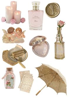 an assortment of items including perfume bottles, angel figurines and other decorative items