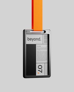 an orange and black id badge with the word beyond on it's front side