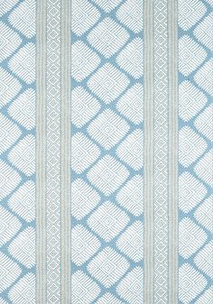 a blue and white striped fabric with an intricate design on the front, in two rows