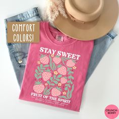 This Fruit of the Spirit Shirt is the perfect trendy Christian t shirt, Christian Merch, and Preppy Jesus Apparel! Our Comfort Colors tees are super soft, DTG printed (printed with ink), and 100% cotton. 🌞 SHOP KIDS' MATCHING SHIRTS BELOW!🌞 https://sunofamother.etsy.com/listing/1763405838/kids-boho-christian-strawberry-shirt ❗❗There may be a slight difference in the colors due to different monitors. ❗❗ 🌞 HOW TO ORDER 🌞 * Select your size and color from the drop-down menu * Add your shirt to cart. If you would like more than one, add each one to cart individually. * Proceed to check out! * Your shirt will be ready to ship in 1-3 days! 🌞 SIZING 🌞 Check the Size Chart and Fit Guide in the photos for reference! 🌞 PRODUCTION + SHIPPING 🌞 * Order Production: 1-3 business days  * Standard Pink Casual Tops With Comfortable Fit, Casual Pink Tops With Comfortable Fit, Casual Pink Shirt With Funny Print, Pink Pre-shrunk Shirt For Spring, Spring Pink Pre-shrunk Shirt, Spring Pink Shirt With Text Print, Pink Shirt With Text Print For Spring, Casual Spring Shirt With Funny Print, Trendy Pre-shrunk Spring Shirt