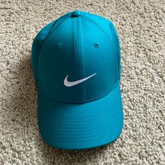 Never Worn! Teal Nike Dri Fit Hat Casual Blue Golf Hat, Blue Short Brim Baseball Cap For Spring, Nike Snapback Hats For Spring, Turquoise Casual Hat For Spring, Turquoise Casual Spring Hat, Nike Cap For Spring, Nike Summer Cap, Nike Spring Cap, Nike Adjustable Spring Hats