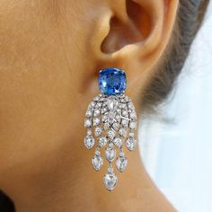 Women Earring, Luxury Jewelry, Heritage Collection, Bridal Earrings, Gift For Women, Bridesmaid Gift, Unique Earring, Party Wear Earrings, Anniversary Gift, Antique Earrings 💍 𝐏𝐑𝐎𝐃𝐔𝐂𝐓 𝐃𝐄𝐓𝐀𝐈𝐋𝐒 💍 ➡ Base Metal : 925 Sterling Silver ➡ GemStone : Sapphire ➡ GemStone Creation : Lab-Created ➡ Diamond : Cubic Zirconia ➡ Earrings Length : 50MM ➡ We use AAAAA+ Grade quality stones ➡ Plating : Rhodium Plated ➡ Hallmark : Yes / S 925 💍 𝐏𝐑𝐎𝐃𝐔𝐂𝐓 𝐈𝐍𝐂𝐋𝐔𝐃𝐄𝐒 💍 ➡ Earrings ➡ Each Or Luxury Blue Dangle Chandelier Earrings, Luxury Blue Drop Earrings, Luxury Blue Pear-shaped Earrings, Elegant Blue Diamond Dangle Earrings, Blue Dangle Diamond Earrings For Gifts, Blue Diamond Dangle Earrings For Gifts, Blue Diamond Dangle Earrings As Gift, Sapphire Dangle Earrings In Fine Jewelry Style, Sapphire Drop Earrings For Party