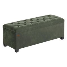 a large green bench with buttons on the top and legs, sitting in front of a white background