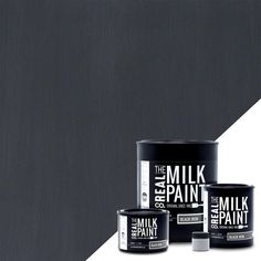 two cans of milk paint next to each other on a white and black background with the same color