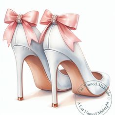 a pair of white high heeled shoes with pink bows