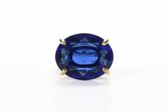 >Crafted in 14k gold-fill, this gorgeous and vibrant cocktail ring exudes elegant vibrance with its large, oval Sapphire stone. A large ring that will stylishly go with your looks, both casual and for special occasions. A statement jewelry and an awesome gift choice for a special lady. ☛ 𝒜𝐵𝒞 - Add Engraving - https://etsy.me/2ZSRjhu ☛ Ring size - Select the size you would like from the drop down menu ♥ Gemstone Type - Sapphire (Lab Created) ♥ Gemstone Size - 16x20mm ♥ Gemstone Cut - Facete Elegant Oval Faceted Sapphire Ring, Oval Faceted Sapphire Ring For Formal Occasions, Fine Jewelry 14k Gold Sapphire Ring With Oval Cabochon, Oval Faceted Sapphire Ring Fine Jewelry, Gold Sapphire Ring Oval Cabochon With Polished Finish, 14k Gold Sapphire Ring With Oval Cabochon For Gift, Luxury Blue Sapphire Oval Cabochon Ring, Luxury Sapphire Ring, Oval Cabochon Cut, September Birthstone Ring