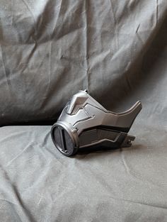 This highly detailed Smoke mask is the closest thing to in game as you will find.  The mask will be printed in a black filament, as shown in the picture.  This mask can be accommodated to fit any head size.   Designed By Yosh Studios Futuristic Black Helmet Mask, Futuristic Black Helmet Mask And Prosthetics, Full Face Black Masks For Cosplay, Full Face Black Mask For Cosplay, Black Helmet Shaped Mask For Protection, Black Helmet-shaped Masks And Prosthetics For Protection, Black Sci-fi Full Face Mask, Sci-fi Full Face Black Mask, Cyberpunk Full Face Black Mask