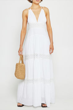 This gorgeous Cher Maxi Dress gives you a long, elegant silhouette crafted from airy 100% cotton fabric. Featuring adjustable straps and beautiful lace trim details, this dress is perfect for an elegant everyday look. Off-white Summer Maxi Dress For Beach, White V-neck Maxi Dress For Beach Season, Off-white Maxi Sundress, White Maxi V-neck Dress For Beach, Non-stretch White Maxi Dress For Beach, Sundress Season, Faithfull The Brand, Silhouette Crafts, Trim Detail