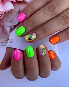 Add a burst of color to your summer mani with these 30 bright neon nails! Whether you're looking for bold and daring or subtle and chic ideas, these nail designs have got you covered. For example, we love these short green, pink and orange neon nails. Orange Neon Nails, Fresh Nail Ideas, Bright Neon Nails, Neon Nail Colors, Short Nail Ideas, Neon Nail Designs, Summer Manicure, Korean Nails, Nail Pops