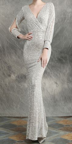 $94.90 - Stunning Sequin Sparkle Light Silver Gray Evening Maxi Dress With Long Sleeves For Elegant Ladies and classy women. This mermaid fishtail dress is bodycon tight fitted with v-neck. Perfect for formal dinners, cocktail party, bridesmaid, prom and evening. #silverdress The fabric is THICK, SOFT and STRETCHABLE. It will fit you well. We do not see through. Our online boutique offers FREE RETURNS, free size exchange and worldwide free shipping. Silver Dresses Elegant, Silver Evening Gown, Shiny Silver Dress, Silver Evening Gowns, Maxi Dress With Long Sleeves, Evening Maxi Dress, Long Sequin Dress, Dresses Traditional, Silver Gown