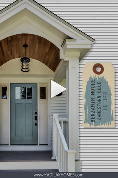 the front door of a house with a welcome sign