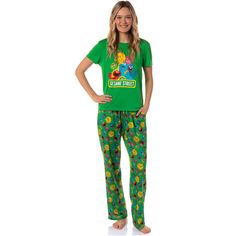 This pajama set is a playful and cozy ensemble that brings the joy of Sesame Street's lovable characters, Elmo, Big Bird, Cookie Monster, and more right into your bedtime routine. Designed for comfort and fun, this pajama set is for adults who cherish the magic of Elmo's world. It is made of 100% polyester for a comfortable fit. Wash cold and tumble low to maintain the vibrant colors of the pajama set. These are the best! Elmo And Friends, Elmo World, Elmo And Cookie Monster, Plus Size Pajamas, Pajama Pant, Bedtime Routine, Big Bird, Womens Pyjama Sets, Sleepwear Sets