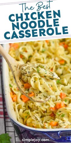 the best chicken noodle casserole in a blue dish with a wooden spoon