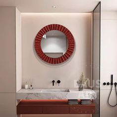 a bathroom with a sink, mirror and shower