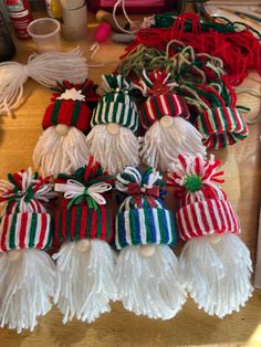 several tasseled ornaments are sitting on a table