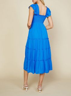 This breezy, lush midi dress is just what you've been waiting for. Featured with a stunning square neckline, smocked bodice, flutter sleeves, a tiered skirt, and the most flattering midi length. With the smocked bodice hugging the silhouette just right, you're sure to love the fit of this style. Be the best dressed to your next event or night out in this vivid blue midi dress. vivid blue smocked bodice square neckline tiered skirt woven midi dress fits true to size 100% polyester Model is 5'8 1/ Tiered Midi Dress, Mid Dresses, Flowy Skirt, Blue Midi Dress, Sweet Dress, Tier Skirt, Tiered Dress, Sheer Fabrics, Square Necklines