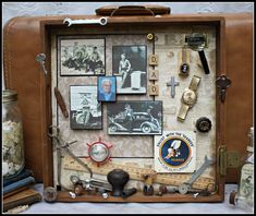 an old suitcase with various items on it