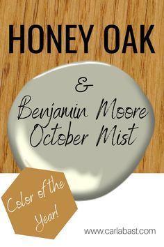 a wooden table topped with a white and black sign that reads honey oak and benjaun meere october mist