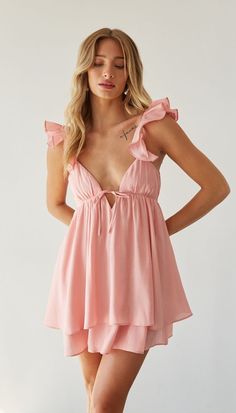 Summer is calling in the Pepper Open Back Ruffle Babydoll Mini Dress! This darling babydoll mini dress features delicate ruffle straps, an open back silhouette, and flirty keyhole cutout! All this wrapped in a bow. Available in White, Black, and Blush.

cute and trendy women's clothing boutique | trendy dress boutique | little white dress boutique | stylish dresses for young women | sorority rush boutique | cute mini dresses | wedding guest inspo | white dresses for graduation Sweater Dress Boots, Back Silhouette, Red Floral Top, Ice Dresses, Babydoll Mini Dress, Red Bodycon, Sweater Maxi Dress, Flattering Dresses, Ruffled Maxi Dress