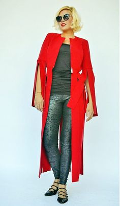 Coat for women with fringes, very playful, bold and daring. Versatile wool jacket, lined with satin in the upper side. The beautiful long coat color will for sure steal the spotlight this fall! This piece is a key element in the LA RAMBLA Collection, being a smooth cocktail of elegance, class, avant-garde and the very modern vibe of the urban scenery in which we live in. Material: 30% wool, 70% polyester Care instructions: Dry clean only The model in the picture is size S. Can be made in ALL SIZ Long Wool Evening Coat For Winter, Evening Wool Long Coat For Fall, Long Winter Outerwear For Evening, Long Winter Evening Outerwear, Evening Long Wool Coat For Fall, Fall Evening Long Wool Coat, Evening Wool Coat For Fall, Fitted Cape Outerwear For Party, Fitted Cape-style Party Outerwear