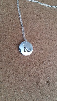 Letter K Necklace, Letter K Jewelry, Monogram Pendant, Personalized Jewelry, Sterling Silver Pendant, Initial necklace, Name Pendant. Handmade letter k pendant in sterling silver.Monogram letter k charm  pendant,hand sewn by myself. Materials is genuine sterling silver,size is 16 mm in 1.5 mm thickness. This pendant is solid silver. Chain length for this pendant is 18 inches,but if you fancy something shorter or longer please do messages me. The pendant will come in a gift box. Mother's Day Silver Initial Pendant Necklace, Mother's Day Sterling Silver Monogram Charm Necklaces, Mother's Day Sterling Silver Monogram Charm Necklace, Personalized Silver Charm Necklaces With Initials, Personalized Monogram Silver Charm Necklace, Sterling Silver Monogram Charm Necklace For Mother's Day, Personalized Silver Monogram Charm Necklace, Silver Monogram Charm Necklace For Mother's Day, Silver Charm Necklaces With Initials For Personalized Gift