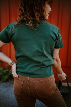 Look alive in the Evergreen Ease Tee! The classic crew neck and short sleeve t-shirt comes in a lush emerald green--a look that's always in style. Experience the comfort of good quality fabric you can rely on! Emerald Green, Lush, Quality Fabric