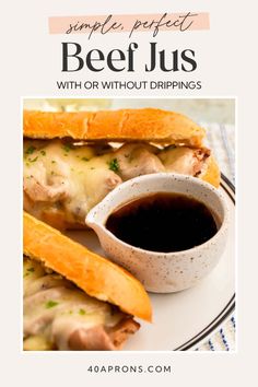 a white plate topped with meat and cheese sandwiches next to a cup of dipping sauce