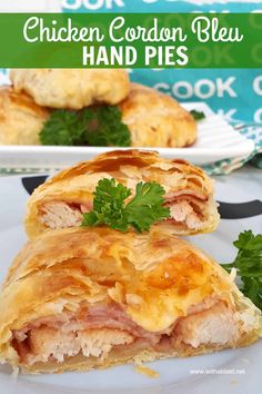 chicken cordon bleu hand pies on a white plate with parsley